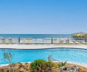 Photo 2 - Sweet Sunrise Oceanfront Condo w Pool Hot Tub