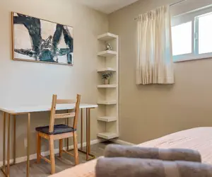 Photo 3 - Modern Retreat With Spacious Yard & Cozy Interiors