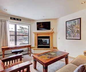 Photo 2 - Quaint Winter Hideaway Sleeps 6- Across From Vibrant Main St 2 Bedroom Condo by RedAwning