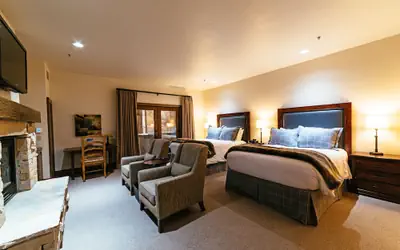 Deluxe Two Queen Room With Fireplace Hotel Room by RedAwning