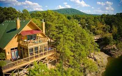 Magnificent Four Bedroom, Two 1/2 Bath luxury, log-sided Harbor North cottage with incredible views of Lake Ouachita. by RedAwning