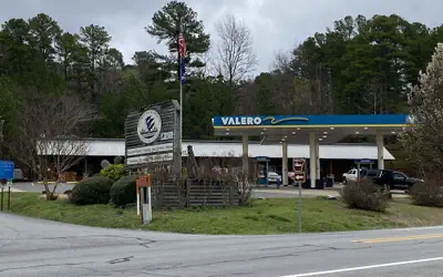 Queen Guest Room located at the Joplin Inn on the highway at the entrance to Mountain Harbor, 2 1/2 miles from Lake Ouachita. by RedAwning