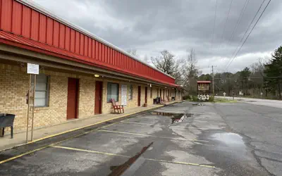 King Guest Room located at the entrance to Mountain Harbor just 2 1/2 miles from Lake Ouachita. by RedAwning