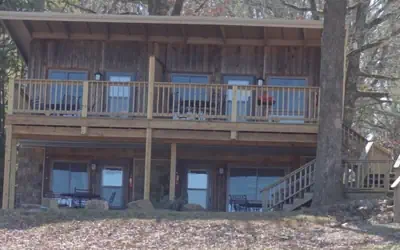 Lake View Queen Guest Room With Two Queens, Sleeper Sofa And Deck Overlooking Lake Ouachita. 1 Bedroom Hotel Room by RedAwning