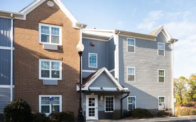 Alluxsuites at 1876, an Ascend Collection Hotel