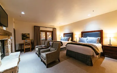 Deluxe Two Queen Room With Fireplace Hotel Room by RedAwning