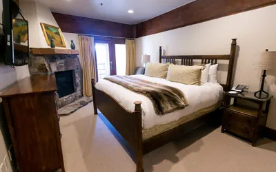 Deluxe King Room With Fireplace Hotel Room by RedAwning