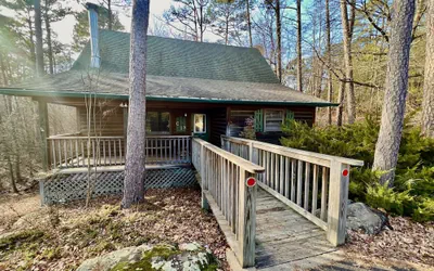 Forest View two bedroom, two bath Harbor North luxury loft cottage with private hot tub o Lake on Ouachita. by RedAwning