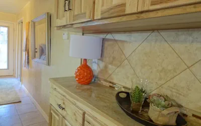 Poolside Queen Cabana with two queen beds, full kitchen and pool access overlooking Lake Ouachita. by RedAwning