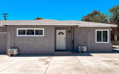 Modern Retreat With Spacious Yard & Cozy Interiors