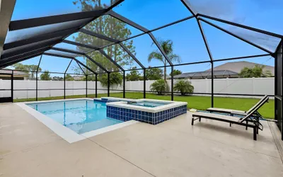 Modern 4BR Retreat Near Beach Heated Pool