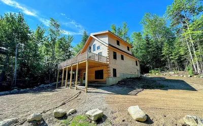 73R 73R Brand new log Home on Quiet Side