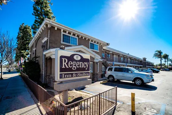 Photo 1 - Regency Inn & Suites