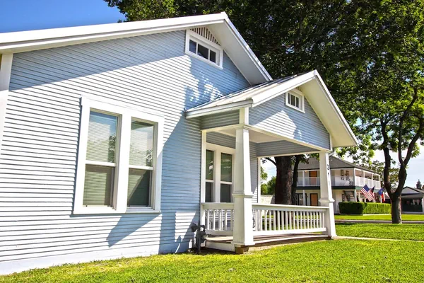 Photo 1 - Peach Tree Inn & Suites